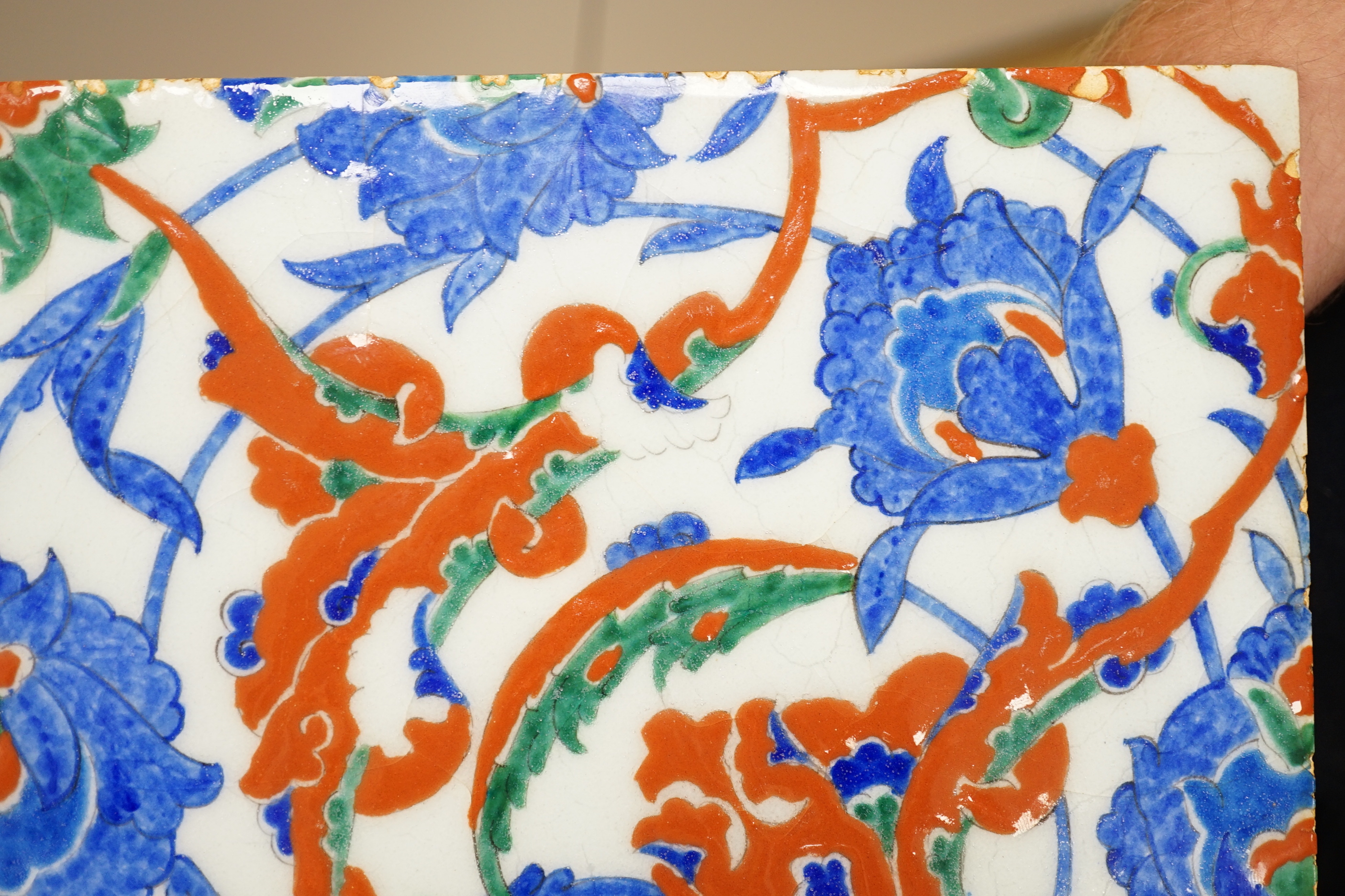 A Turkish Iznik tile, 25cm sq